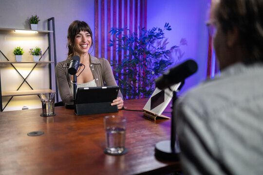 Professional podcast recording setup with interview