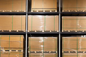 Solar panels stored on industrial warehouse shelves