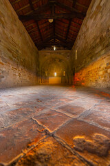 Interior of the ancient Church of San Martino di Treville showcasing its rustic charm and...