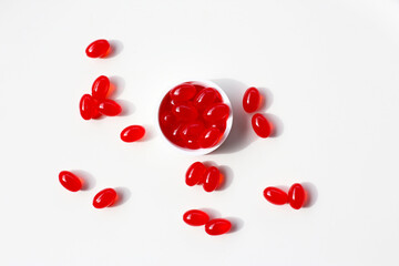 Red softgel Q10 capsules for dietary supplement.