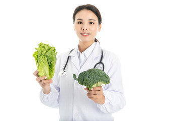 Young Chinese female doctor on white background