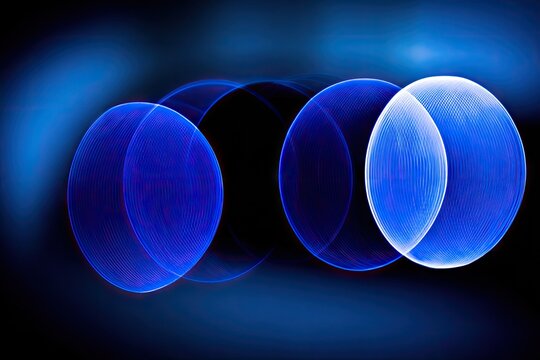 Abstract light circles in motion on a dark background