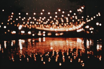 Nighttime outdoor event, blurred lights reflected on water