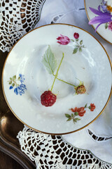   vintage white plate with berries