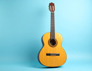 Obraz premium acoustic guitar on light blue background