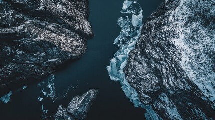 Aerial View of Ice Chasm Between Rugged Cliffs, Moody Landscape.