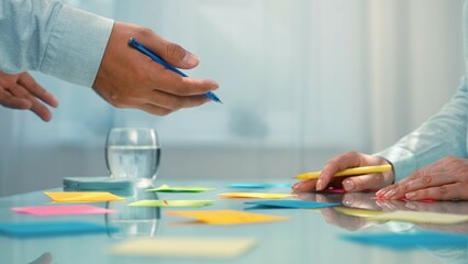 Collaborative Team Meeting with Colorful Sticky Notes