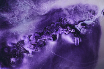 Abstract colorful background. Moving flow of purple paints, fluid liquid art, space sky