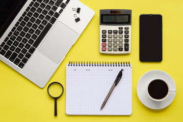 A modern workspace usually features a laptop, coffee cup, and neatly arranged stationery