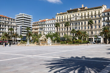 Place Liberte in Toulon on the Mediterranean in spring, with hotels, cafes and fountains