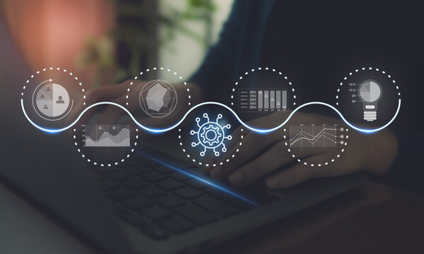 AI Driven Customer  Analytics Concept. Hands typing on a laptop with a digital overlay of interconnected data analysis and artificial intelligence icons, representing an AI powered customer insights.