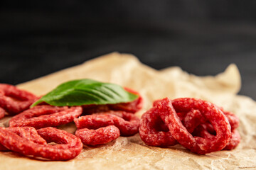 Salami snack mold brezel sausage mini fresh delicious gourmet food background on the table rustic...