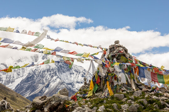 Prayer flags and cairn at Kala Patthar in the Himalayas