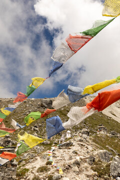Colorful prayer flags against Himalayan landscape