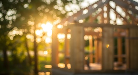 Soft focus sunlit view of a new residential building frame, a symbol of growth and potential, with natural light embracing the architectural foundation.