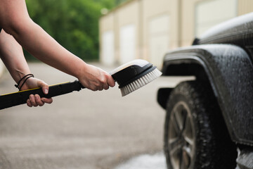 Car wash with brush tool for thorough cleaning