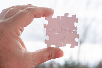 Jigsaw wooden white puzzle pieces, problem-solving and creative thinking, concept idea, level mind,...