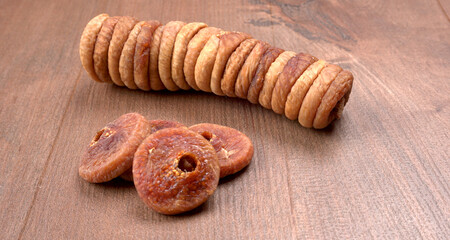 Fresh Figs or Anjeer fruit healthy vegan food concept organic dry fruits on wooden background.