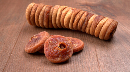 Fresh Figs or Anjeer fruit healthy vegan food concept organic dry fruits on wooden background.