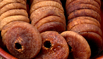 Fresh Figs or Anjeer fruit healthy vegan food concept organic dry fruits on wooden background.