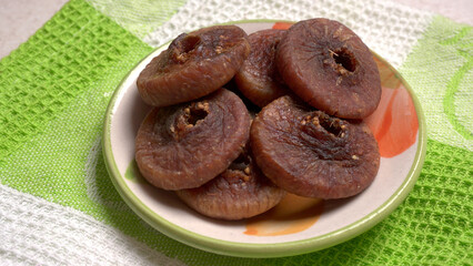 Fresh Figs or Anjeer fruit healthy vegan food concept organic dry fruits on wooden background.