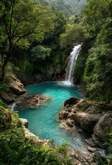 Naklejka premium Serene Waterfall Cascading into a Crystal-Clear Pool Surrounded by Lush Greenery in a Tropical Rainforest Paradise