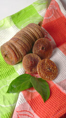 Fresh Figs or Anjeer fruit healthy vegan food concept organic dry fruits on wooden background.