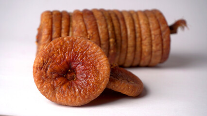 Fresh Figs or Anjeer fruit healthy vegan food concept organic dry fruits on wooden background.
