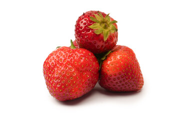 Fresh group of berries isolated on a white background.