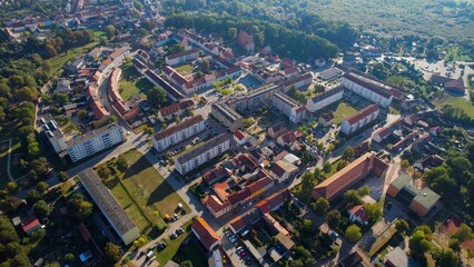 Aerial panoramic view around the old town of the city Woldegk on a sunny morning in summer in Germany.