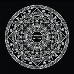 White mandala pattern on black background
