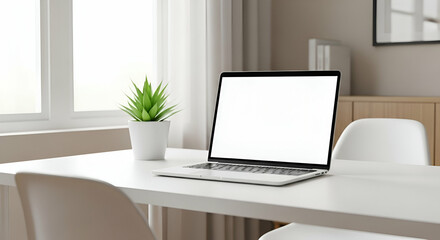 Modern Workspace with Laptop and Plant on White Table in Bright Room Ideal for Home Office Efficiency and Creative Inspiration