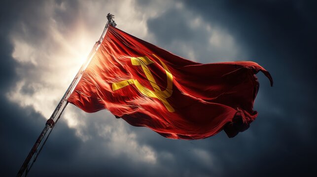Waving Soviet Union flag with hammer and sickle under dramatic sky captured in cinematic light perfect for historical visuals, political documentaries and communist symbolism themes
