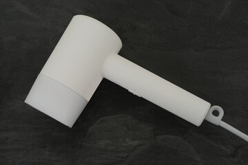 modern white hairdryer, Beauty tool and accessories for fresh, clean look, personal care products...