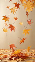 Colorful autumn leaves falling and accumulating on the ground, creating a warm and inviting atmosphere with their vibrant hues against a soft, neutral background