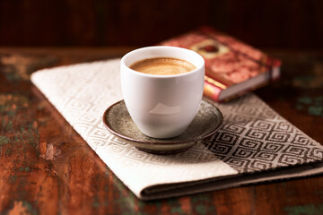 Cup of coffee on wooden background. Soft focus. Copy space	
