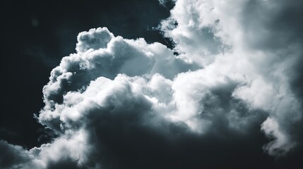 Dramatic storm clouds in deep blue, a sweeping skyscape with dynamic light, nature's raw power on display