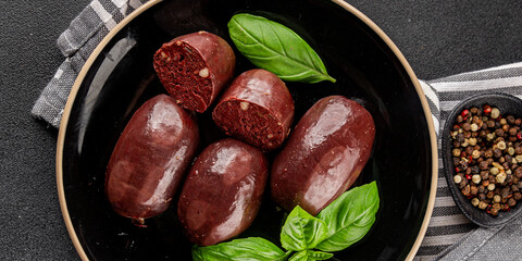 Black pudding sausage fresh delicious gourmet food background on the table rustic food top view...