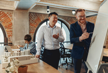 Team members actively participate in a dynamic brainstorming session, showcasing their creativity...