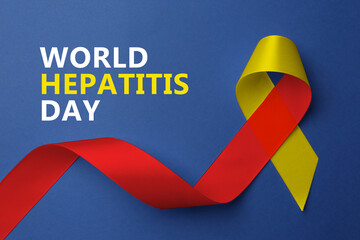 28th july World Hepatitis Day. Yellow-red awareness ribbon on blue background, top view