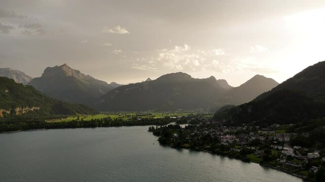 Scenic Aerial View of Walensee Lake and Alpine Mountains at Sunset in Switzerland