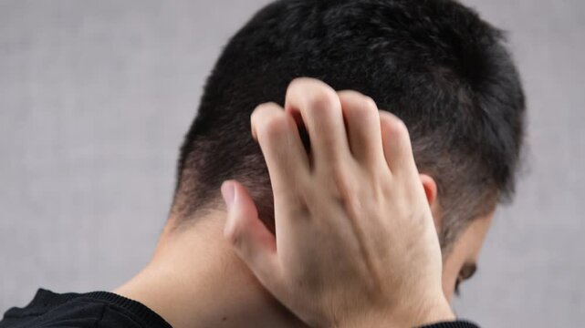 itching scratching head neck