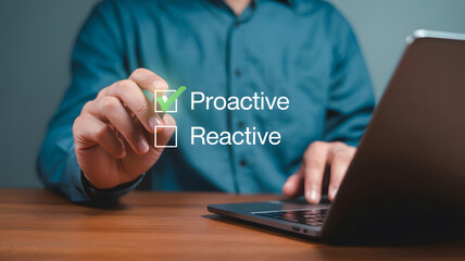 Business professional selects proactive choice with tick on checklist using laptop for strategic decision making at office setting.
