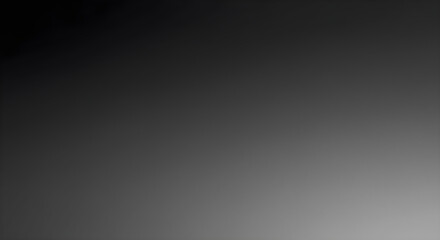 Fototapeta premium A gradient of dark to light gray, creating an abstract and minimalist composition.