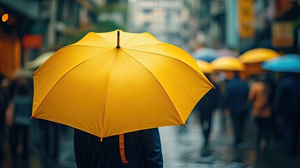 Yellow Umbrella in Crowd for Event and Festival Protection