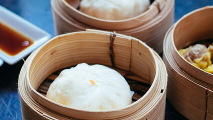 Steamed Buns And Dumplings In Bamboo Steamer Presentation