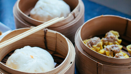 Assorted Dim Sum Served In Traditional Bamboo Steamers