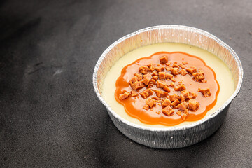 Cheesecake salted caramel sweet dessert fresh delicious gourmet food background on the table rustic food top view copy space