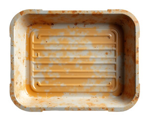 Dirty plastic food tray. Empty and stained with meal residue. Unhygienic and wasteful