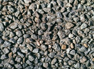 Granite stones filled with cement mortar. Stone texture. Grunge background.